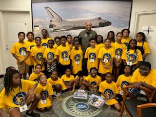 Students in yellow shirts